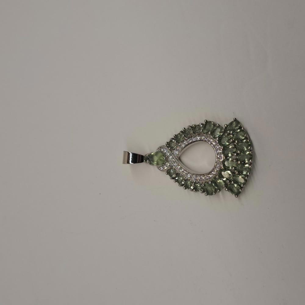 Silver pendant with beautiful green stones and cz